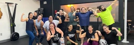 Raw Kickboxing and Fitness Group of People Flexing